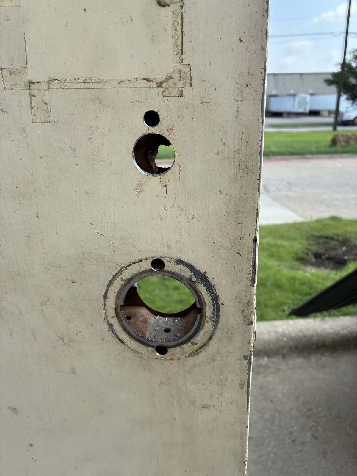 Commercial door prepared for new lock hardware